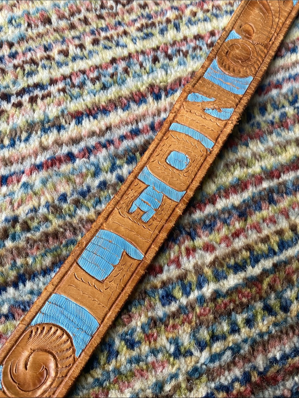 Embossed Leather Belt with “Leon”